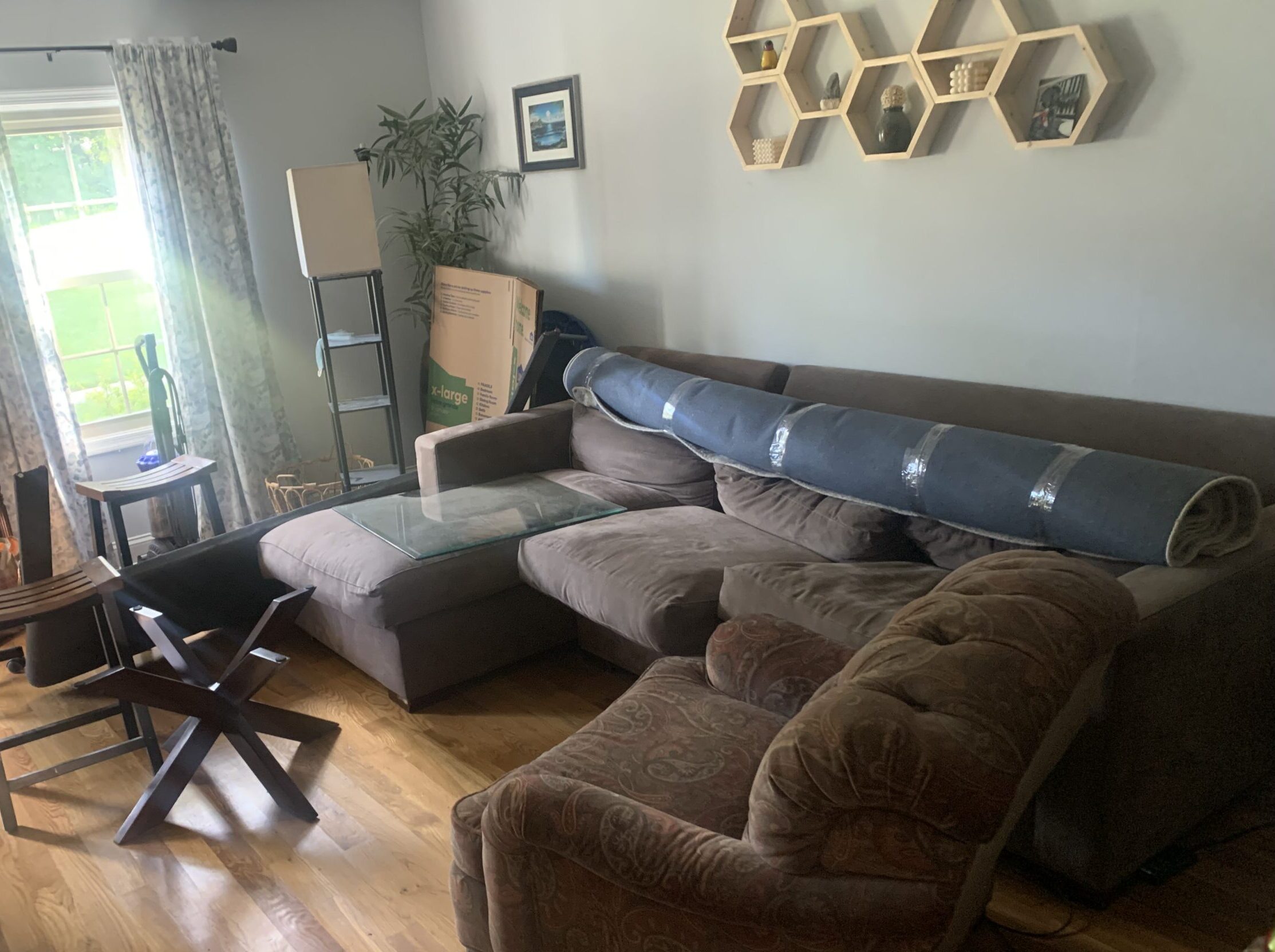 family room area with couch before junk removal